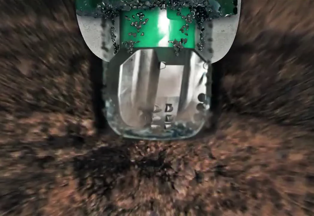 Varel CASEBIT animation frame showing a close cutting mechanism inside rock