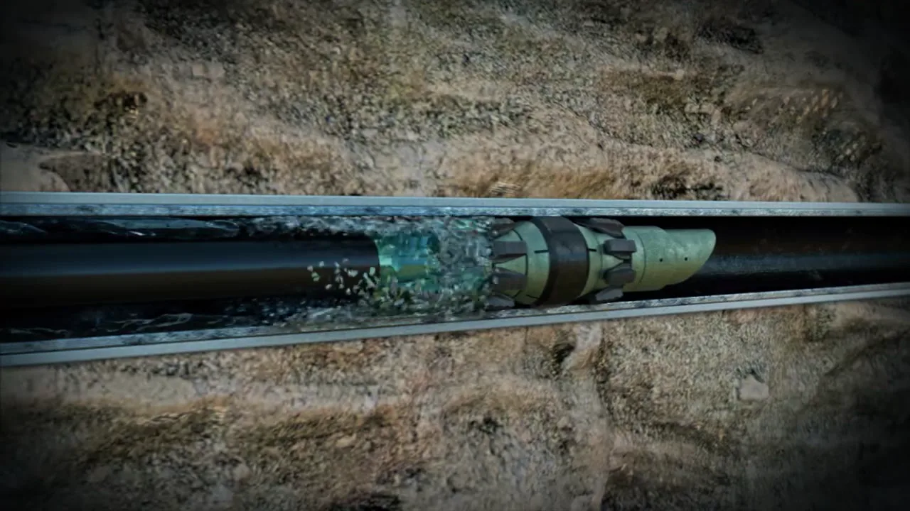 Cutaway animation of a Varel Slipstream bit cutting through rock in the wellbore
